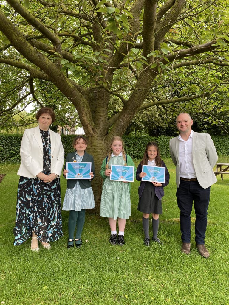 Sylvia Brett, Principal of Harrogate Ladies' College and Nick Hancock from Your Harrogate with prize winners