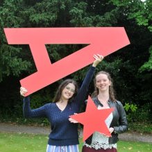 Friends Ellie Boon and Charlotte Ingram celebrating