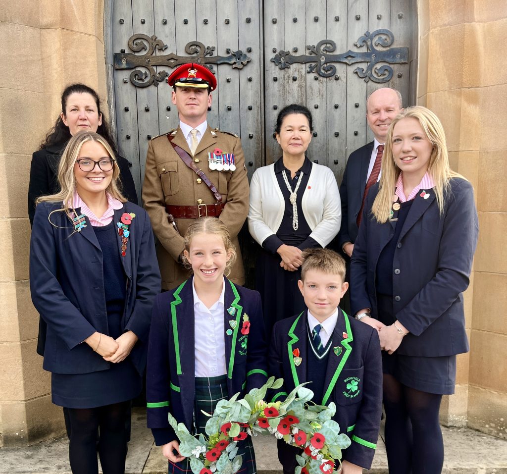 Staff, students and guest speakers celebrate Remembrance Day at Harrogate Ladies' College.