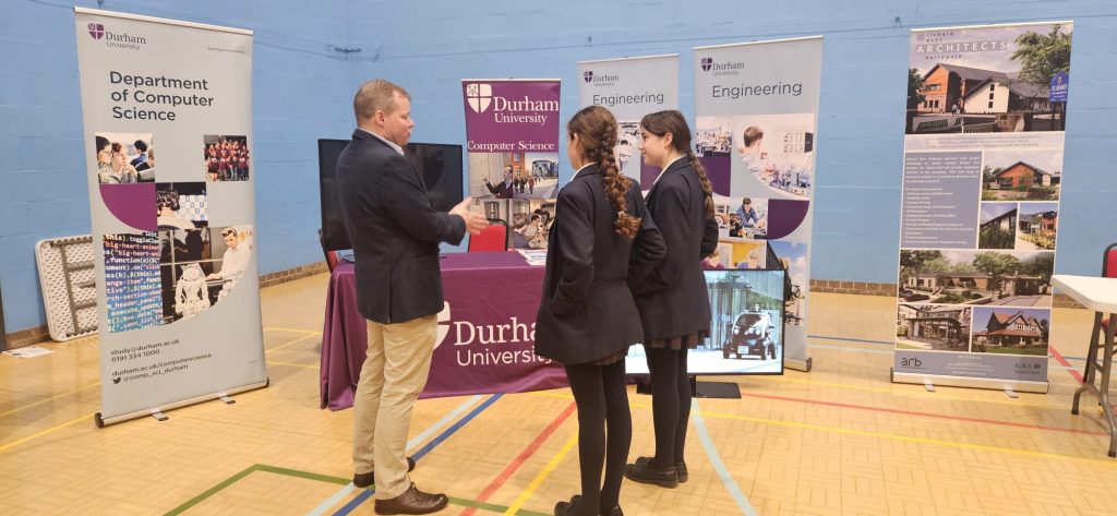 Pupils interacting with exhibitors at Harrogate Ladies' College Careers Fair